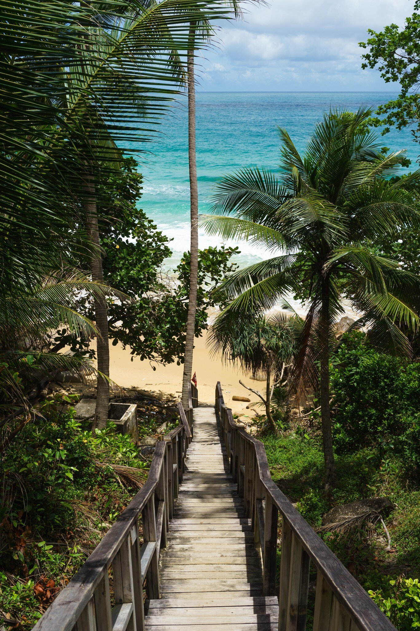 A photo of the stairway leading down to the small and secluded Naithon Beach in Phuket, Thailand. , License Type: media, Download Time: 2026-04-21T20:08:07.000Z, User: LP_ZRay, Editorial: false, purchase_order: 65050 - Digital Destinations and Articles, job: Lonely Planet, client: App Content, other: Zayira Ray