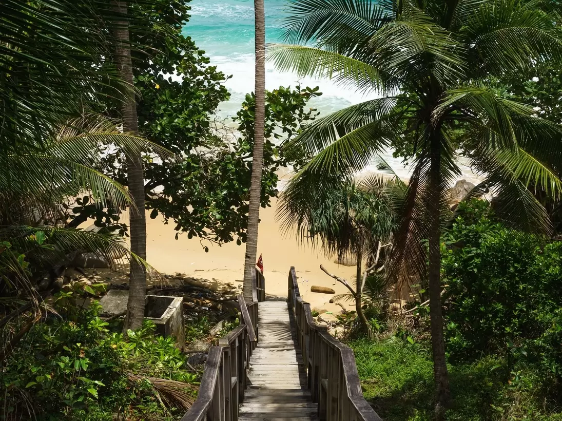 A photo of the stairway leading down to the small and secluded Naithon Beach in Phuket, Thailand. , License Type: media, Download Time: 2026-04-21T20:08:07.000Z, User: LP_ZRay, Editorial: false, purchase_order: 65050 - Digital Destinations and Articles, job: Lonely Planet, client: App Content, other: Zayira Ray