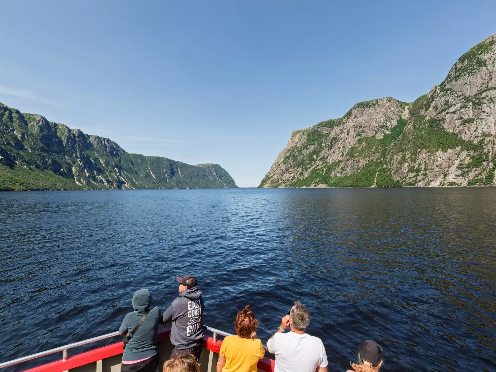Gros Morne National Park, NL, Canada. -August 5, 2023: Sunny day, tourists. Western Brook Pond, a fjord formed by glacial erosion. Ancient landscape is a UNESCO World Heritage Site., License Type: media, Download Time: 2025-12-02T16:27:24.000Z, User: mvm_lonelyplanet, Editorial: true, purchase_order: 56530 - Guidebooks, job: Experience Canada 1, client: Global Publishing-WIP, other: Virginia Moreno