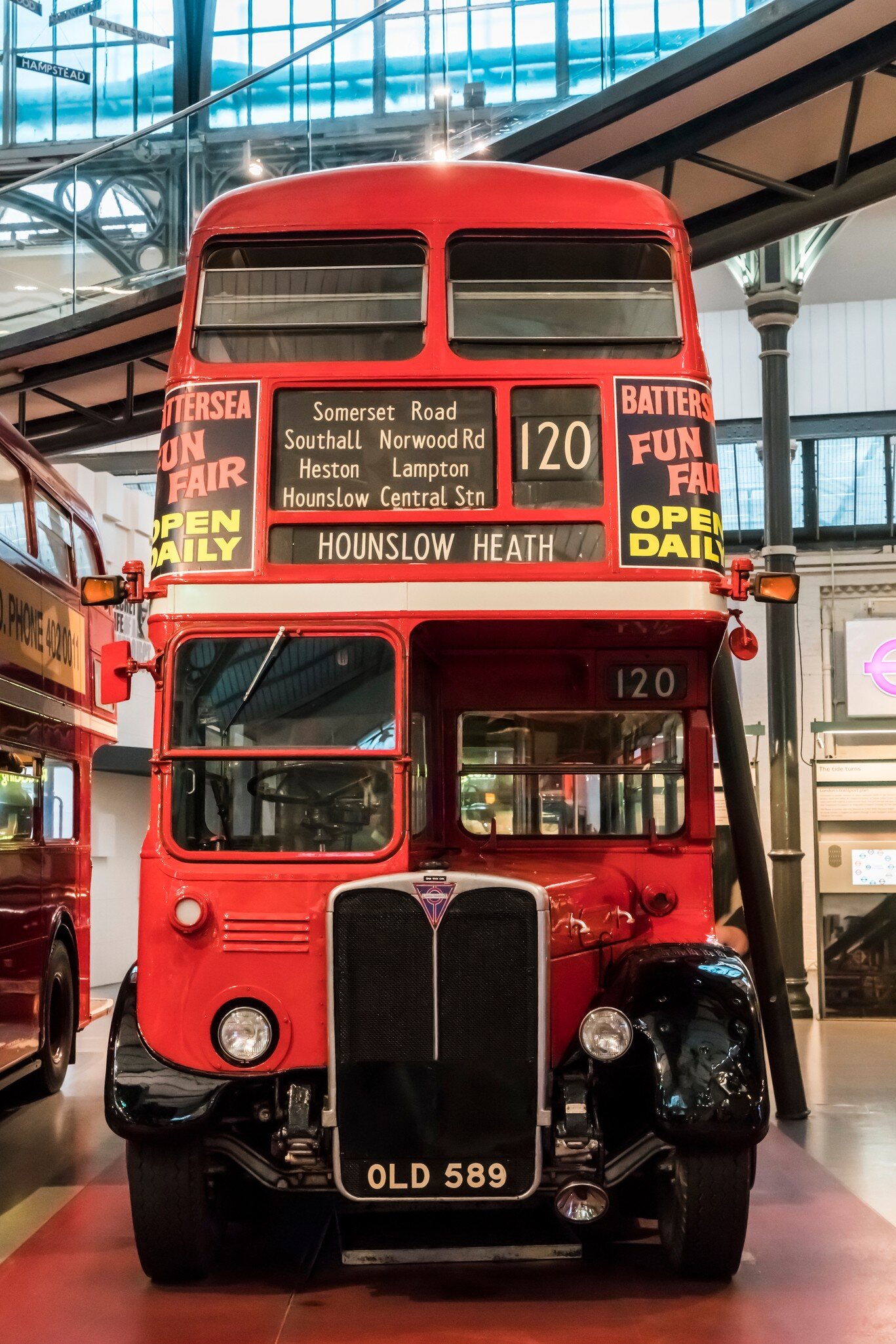 A vintage double-decker bus at the London Transport Museum in London, UK.