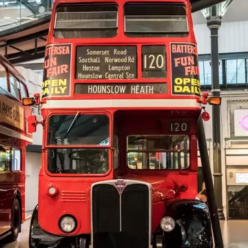 A vintage double-decker bus at the London Transport Museum in London, UK.