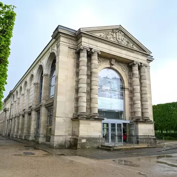 Wide-angle exterior of Jeu de Paume museum. Art centre for photography and media. Paris, France.