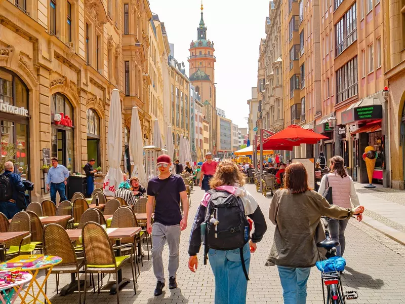 Cityscape of historical downtown and shopping center in Leipzig at spring warm sunny day