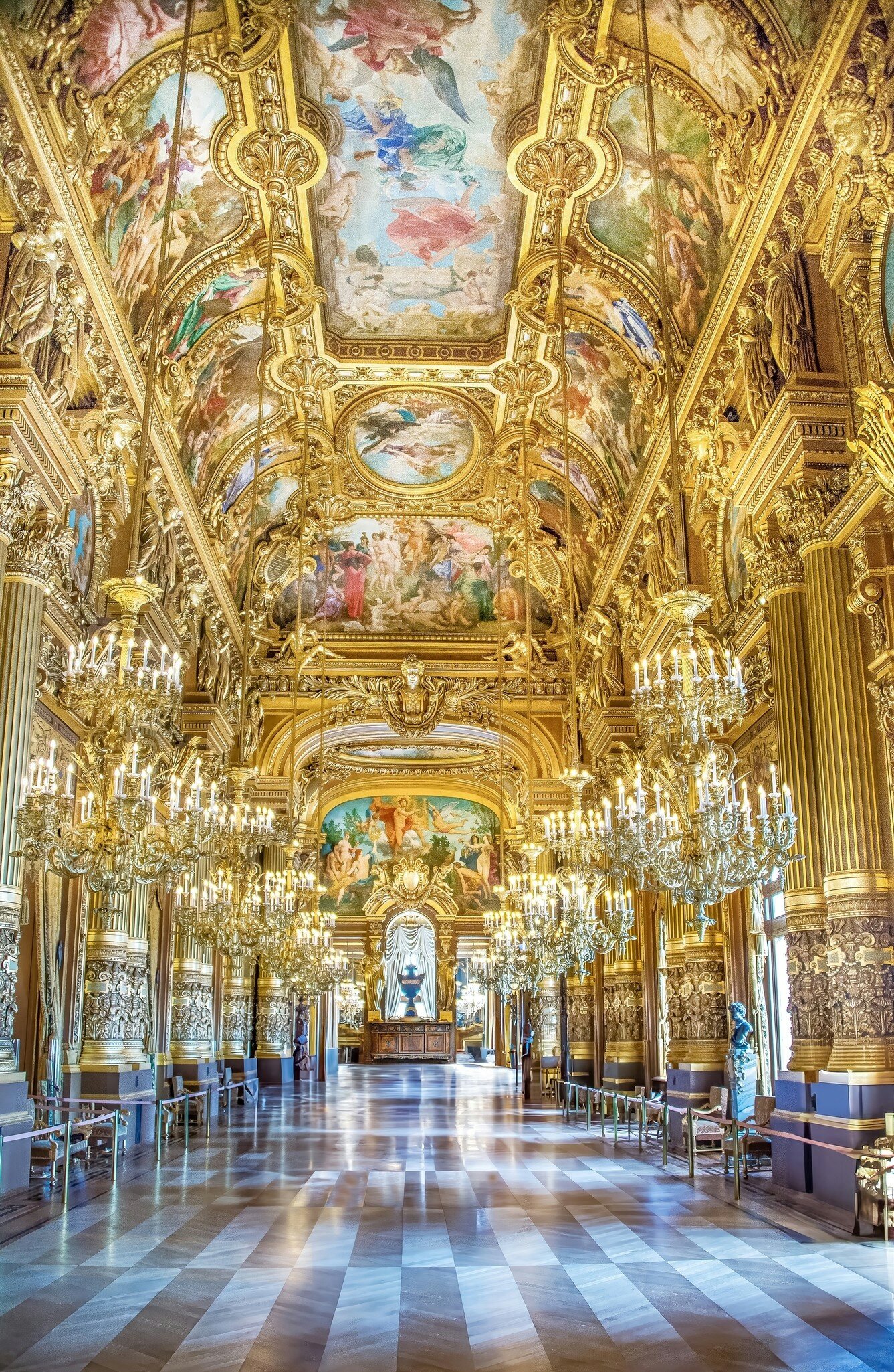 The Grand Foyer of the Palais Garnier (Garnier Palace), also known as L'Opéra Garnier (Garnier Opera House), in Paris, France on a summer day.