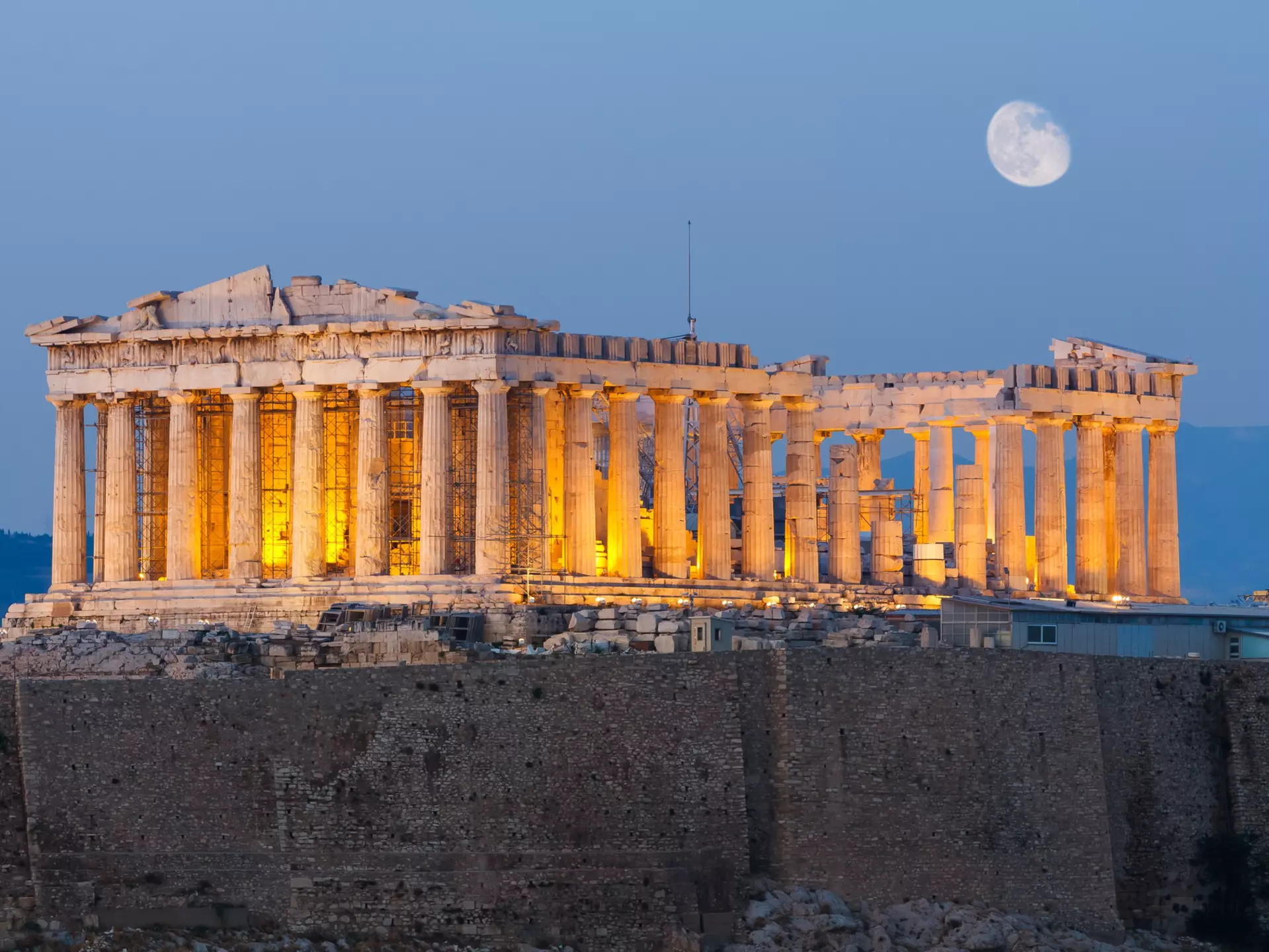The glorious Parthenon on Acropolis hill in Athens in the early evening. PNIK / Shutterstock