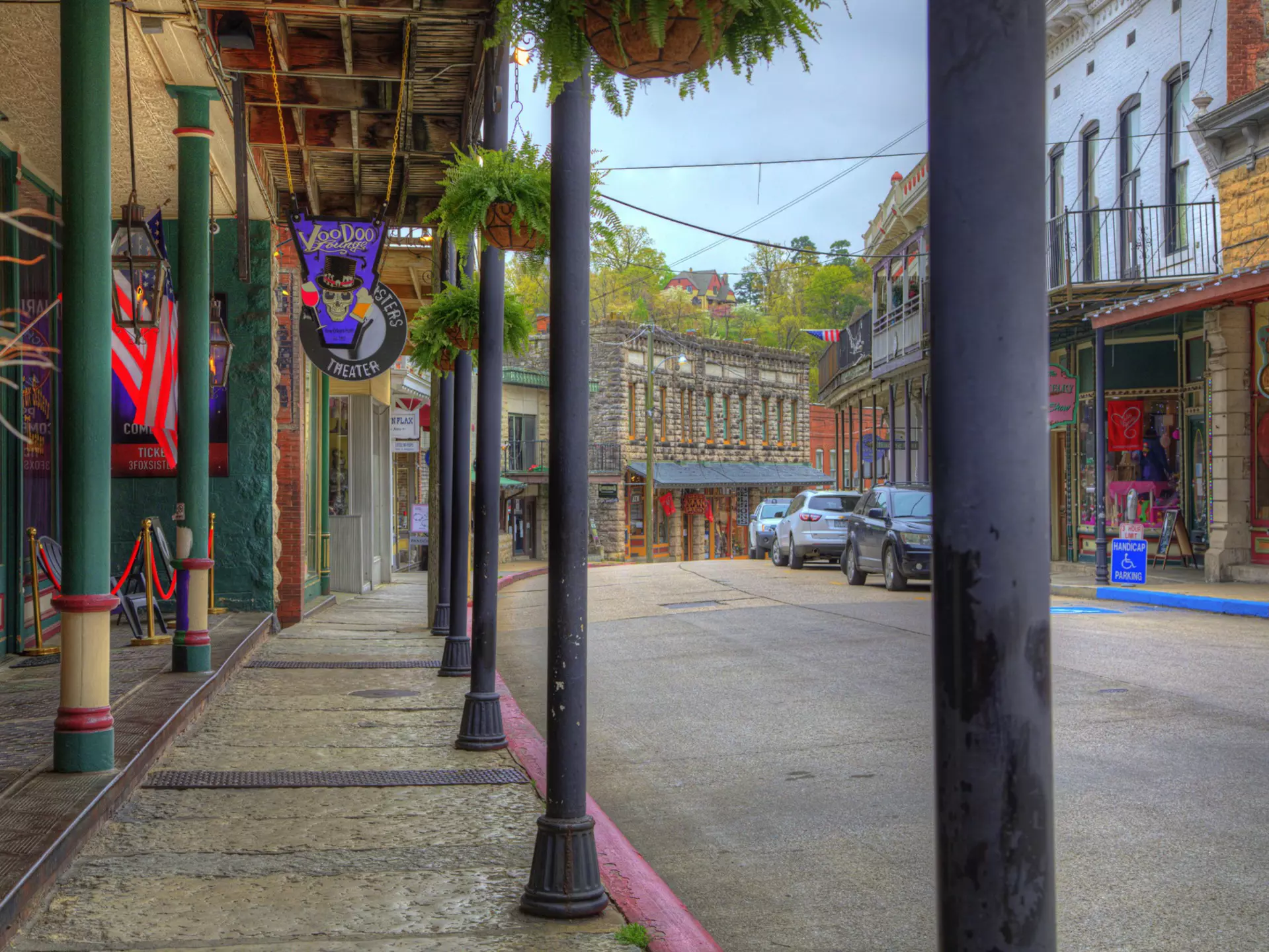 The colorful shopfronts and porches of Spring Street in Eureka Springs, Arkansas