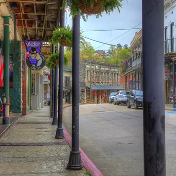 The colorful shopfronts and porches of Spring Street in Eureka Springs, Arkansas