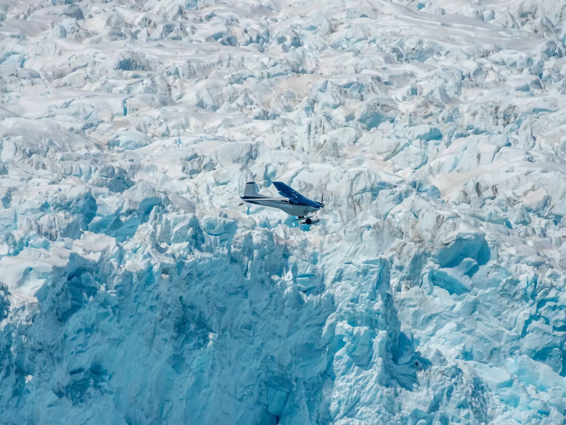 Exploring the Aialike Glacier on an airplane, Kenai Fjords National Park, Seward, Alaska, USA, License Type: media, Download Time: 2025-12-03T20:07:02.000Z, User: mvm_lonelyplanet, Editorial: false, purchase_order: 56530 - Guidebooks, job: Alaska 15, client: Global Publishing-WIP, other: Virginia Moreno