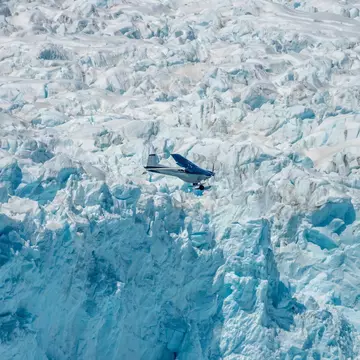 Exploring the Aialike Glacier on an airplane, Kenai Fjords National Park, Seward, Alaska, USA, License Type: media, Download Time: 2025-12-03T20:07:02.000Z, User: mvm_lonelyplanet, Editorial: false, purchase_order: 56530 - Guidebooks, job: Alaska 15, client: Global Publishing-WIP, other: Virginia Moreno