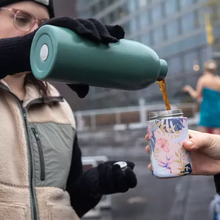 Pouring a hot drink from a flask