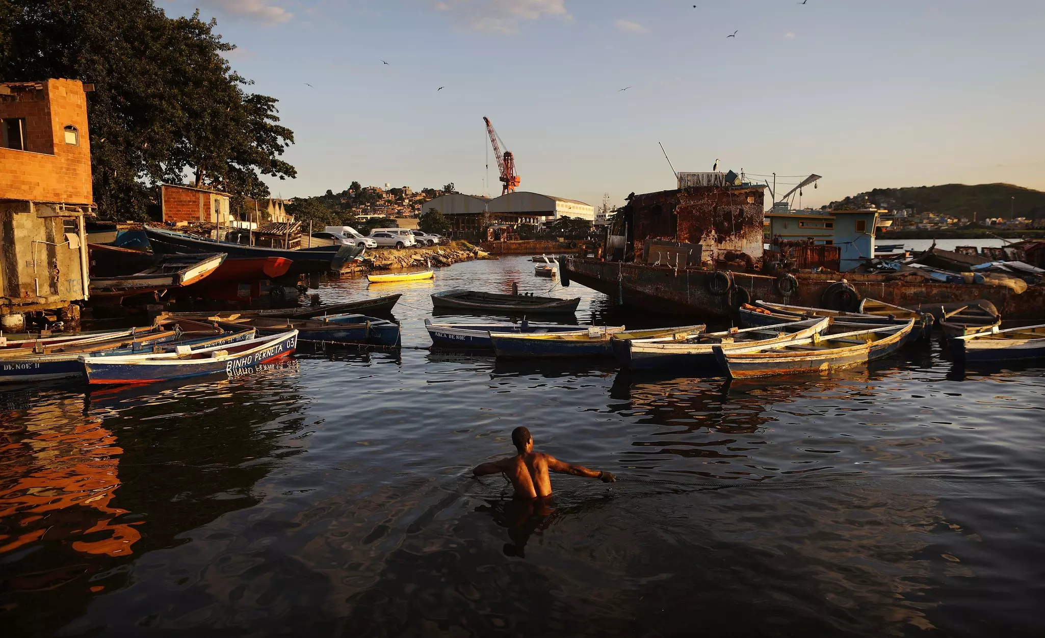 With millions of people living close to its shoreline, Rio’s Guanabara Bay has suffered from pollution for decades © Mario Tama / Getty Images