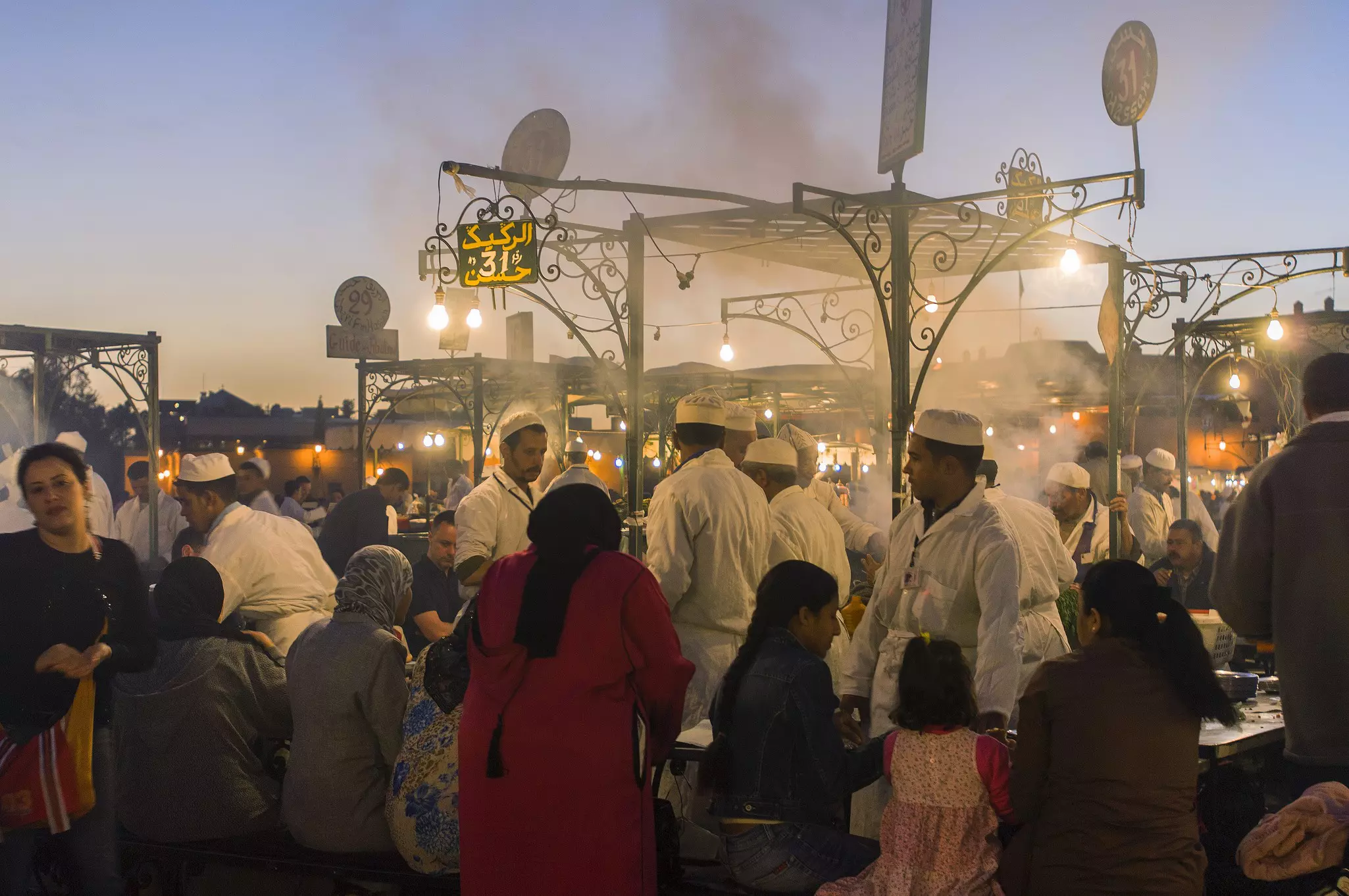 Djemaa El Fna is busiest around sunset, with a magical atmosphere that kids will love © Maremagnum / Getty Images
