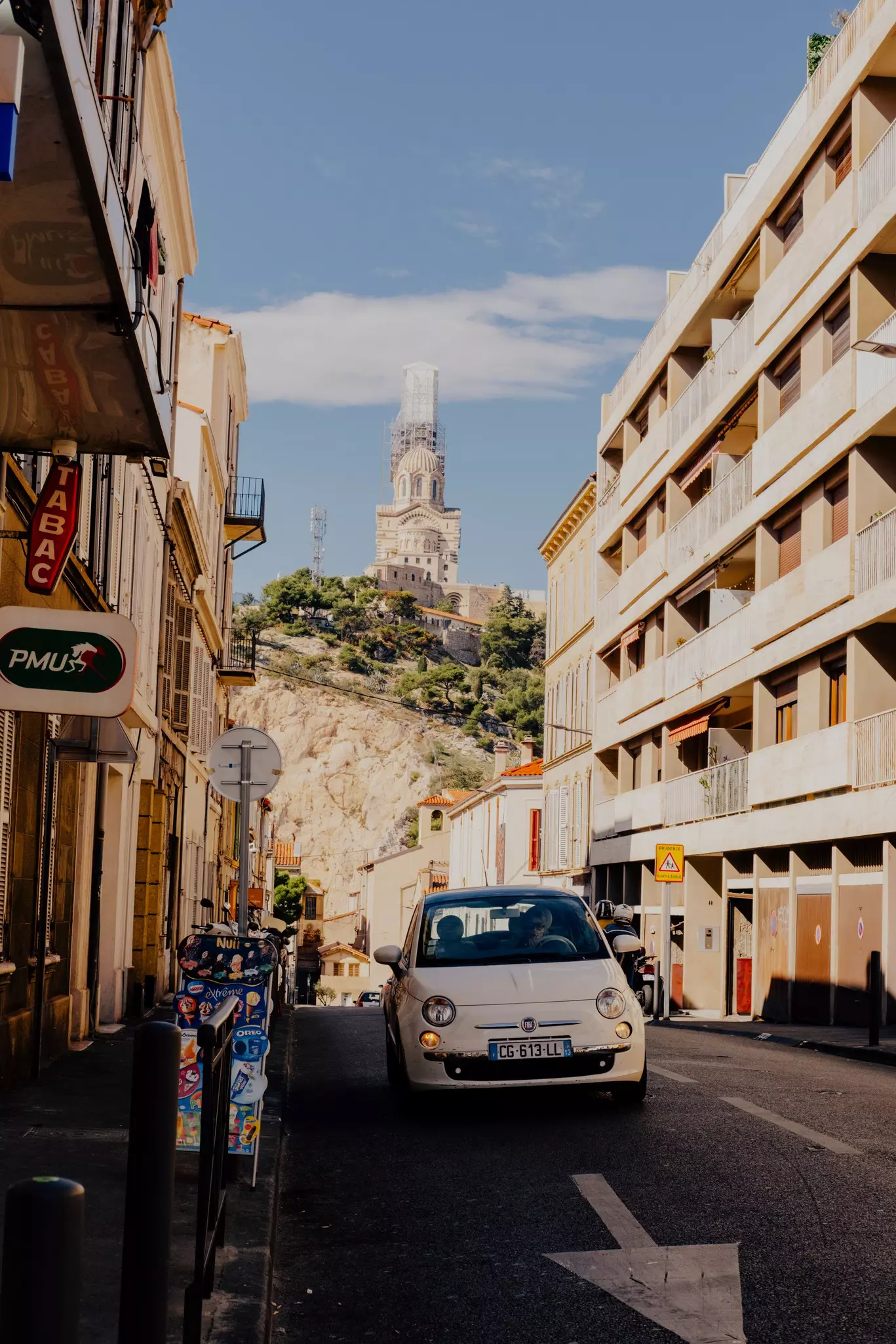 Cycling the Costa Brava and Southern France — September 2025
A street with the Notre-Dame de la Garde basilica in the back in Marseille, France