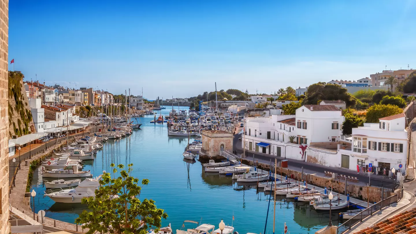 View of the Ciutadella Harbor on a sunny day on the island of Menorca in Spain.