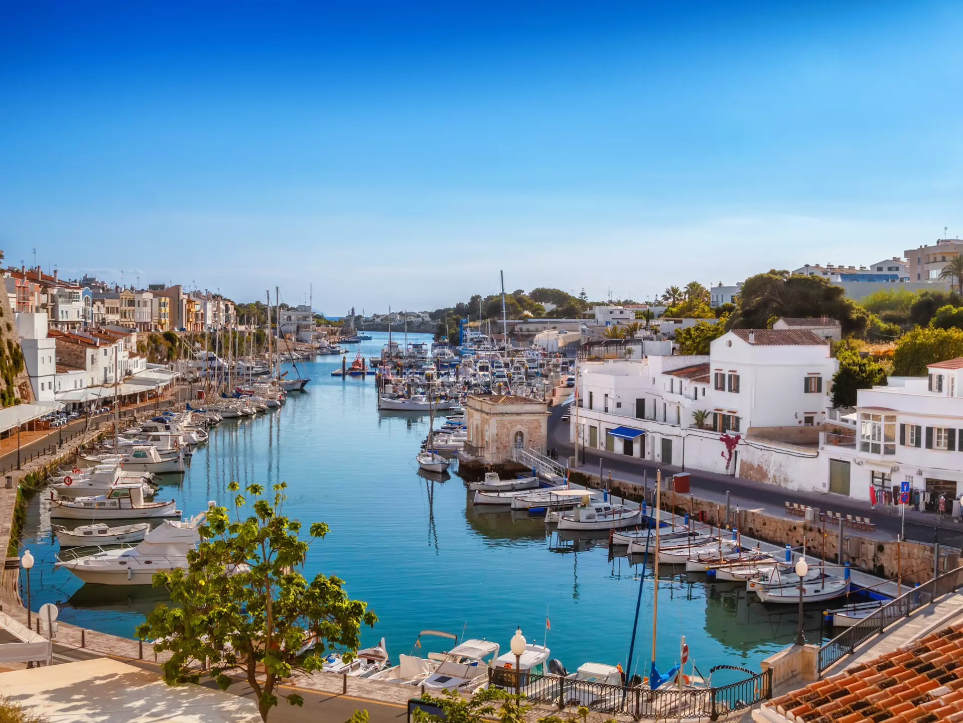 View of the Ciutadella Harbor on a sunny day on the island of Menorca in Spain.