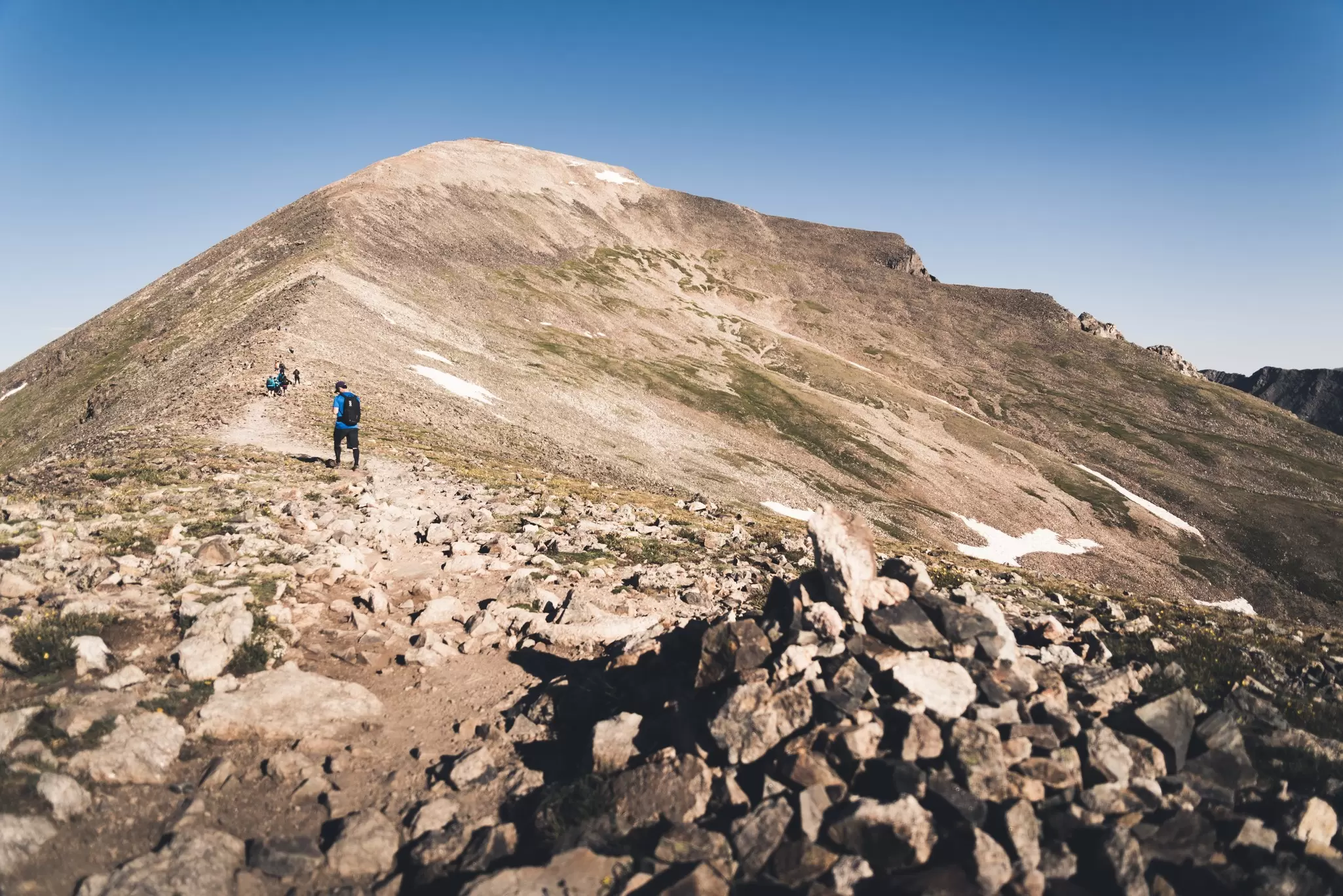 People hiking up the steep section of Quandary Peak in Colorado.   License Type: media  Download Time: 2023-05-12T01:48:19.000Z  User: dermothegarty77  Is Editorial: No  purchase_order: