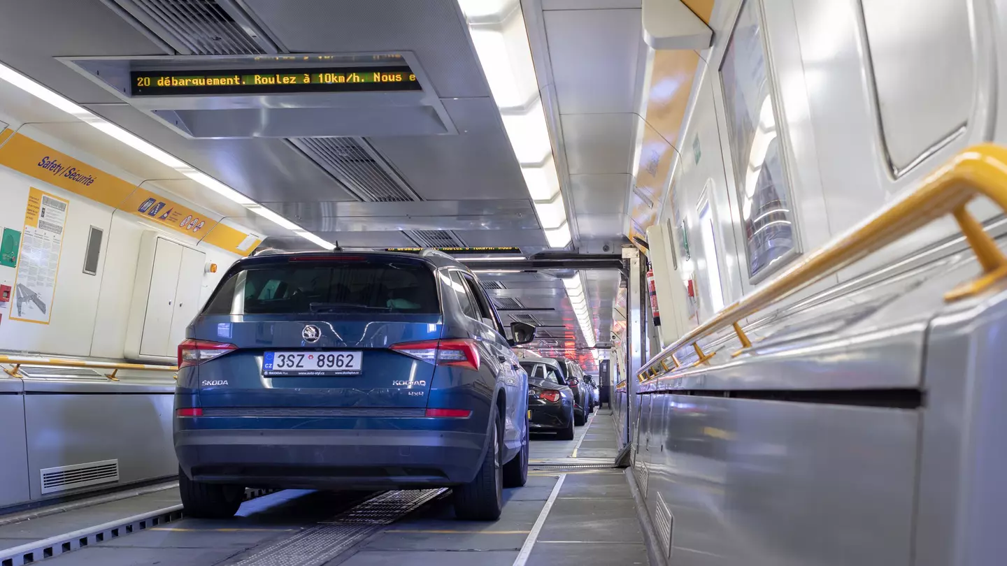 Cars lined up bumper to bumper inside a Eurotunnel train