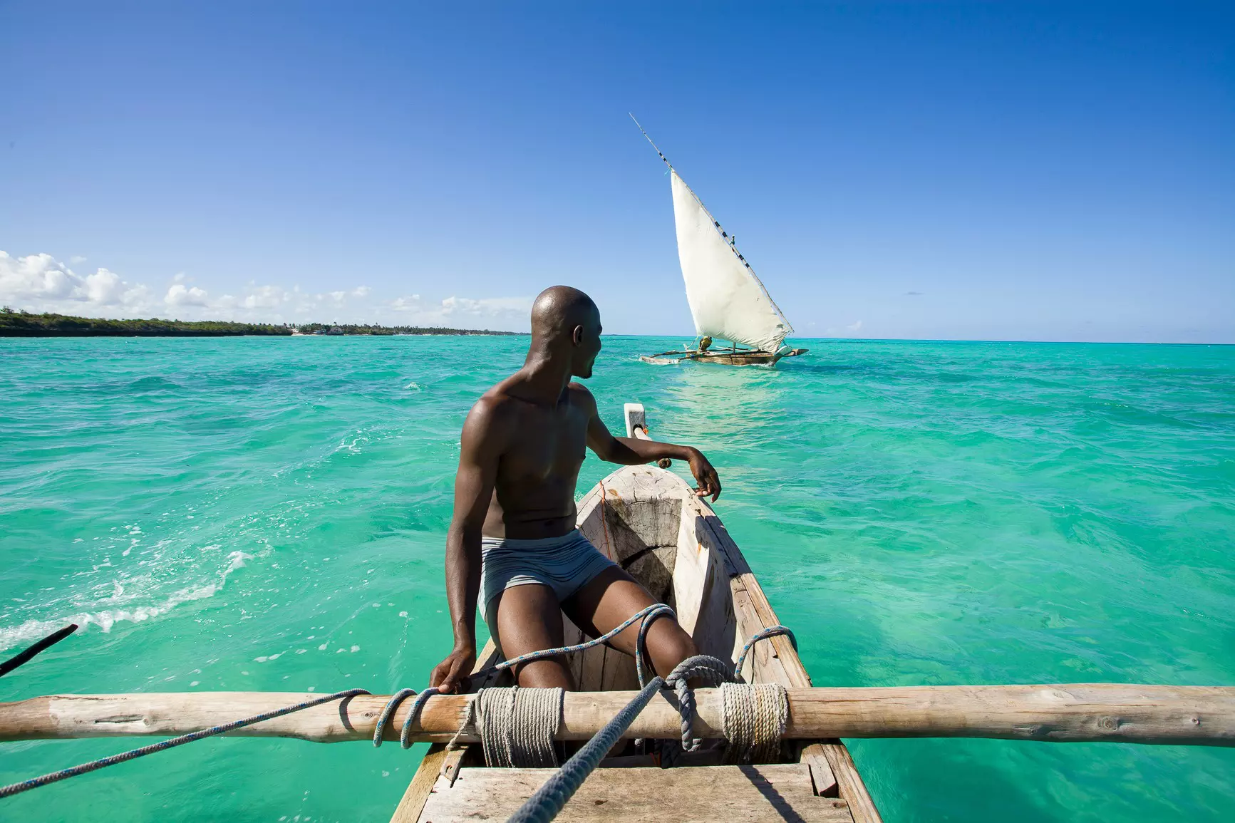 The sun-kissed coast of Zanzibar is tropical perfection © Hugh Sitton / Stocksy United