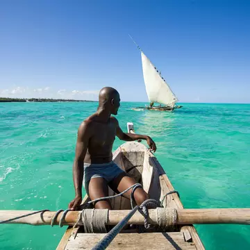 The sun-kissed coast of Zanzibar is tropical perfection © Hugh Sitton / Stocksy United