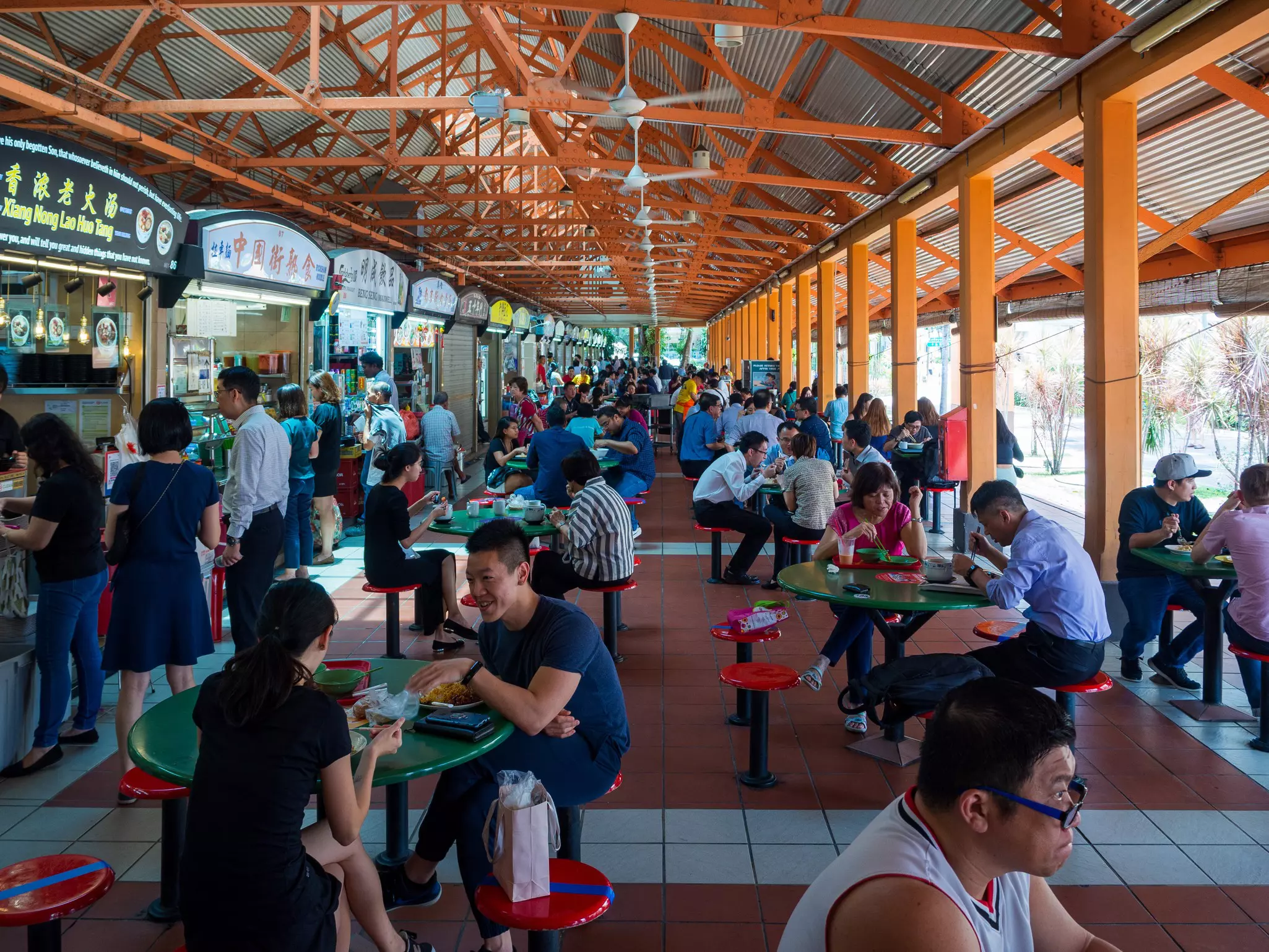 Diners at the Maxwell Food Centre, a covered hawker court in Singapore.