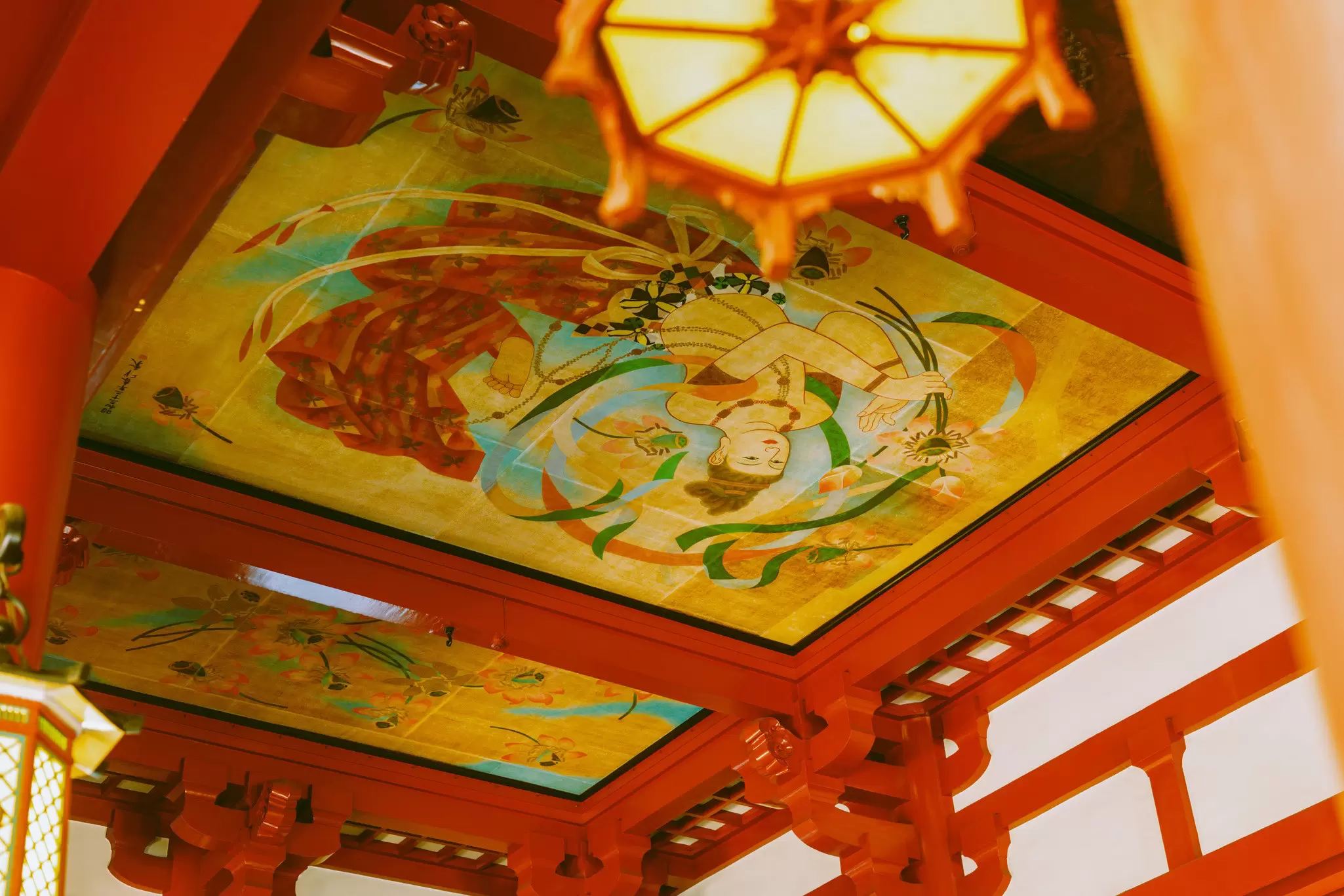 TOKYO, JAPAN. APRIL 2025. 
ASAKUSA
Ceiling of Sensō-ji with a painting of a reclining Buddha holding a lotus