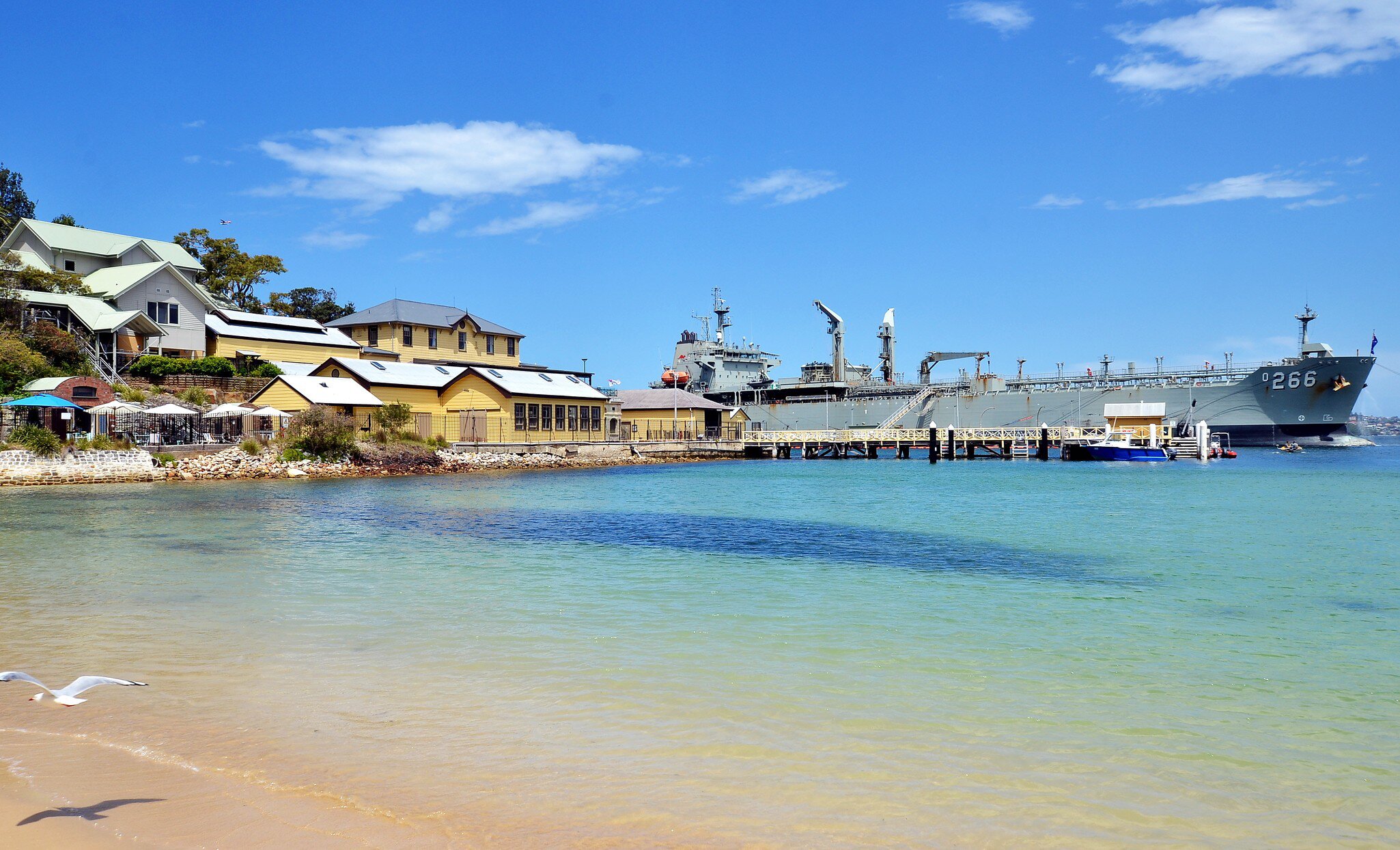 View on Chowder Bay beach and military ship in Sydney Harbour National Park, Australia.