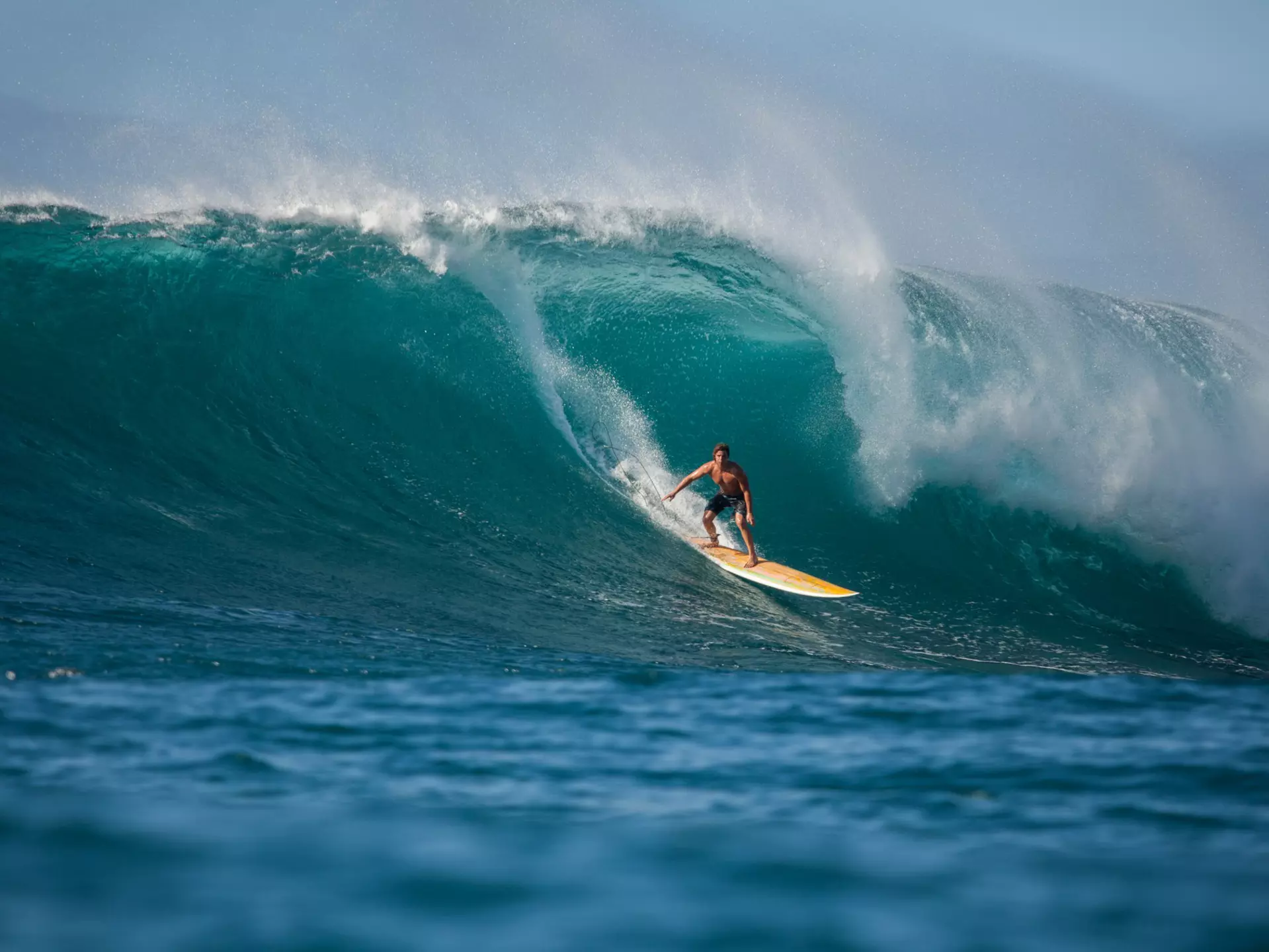 Man surfing wave, Waimea Bay, North Shore, Oahu, Hawaii, America, USA