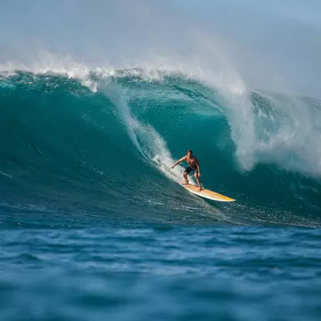 Man surfing wave, Waimea Bay, North Shore, Oahu, Hawaii, America, USA