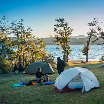 Wilderness camp by the lake on a bike trip through at Lago Yehuin in Tierra del Fuego, Argentina.