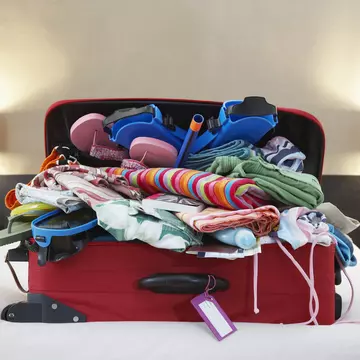 Whittle down your packing list to suit your destination. bikeriderlondon/Shutterstock