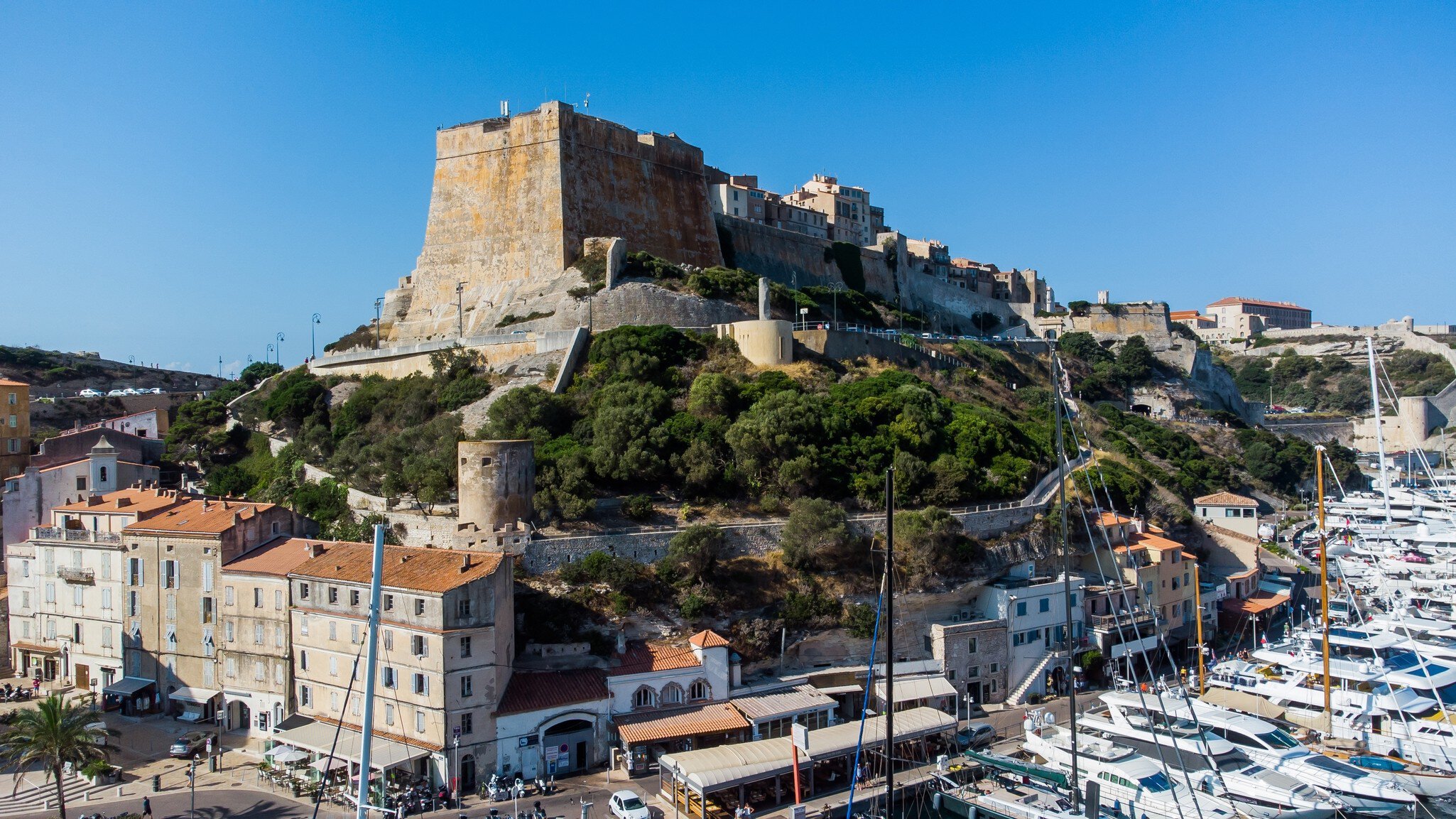 View of the Bastion de l'Étendard in the fortress of Bonifacio in the south of the island of Corsica in France. Medieval citadel built on a rocky promontory overlooking the Mediterranean Sea.