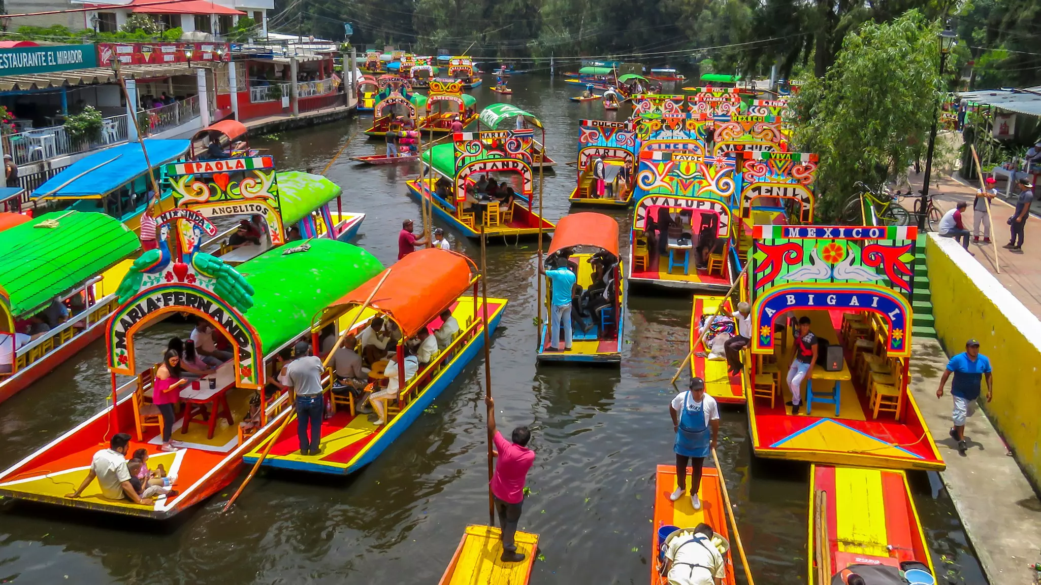 Exploring the Xochimilco canals by boat is a great family day out in Mexico City. Libia Segura/Getty Images