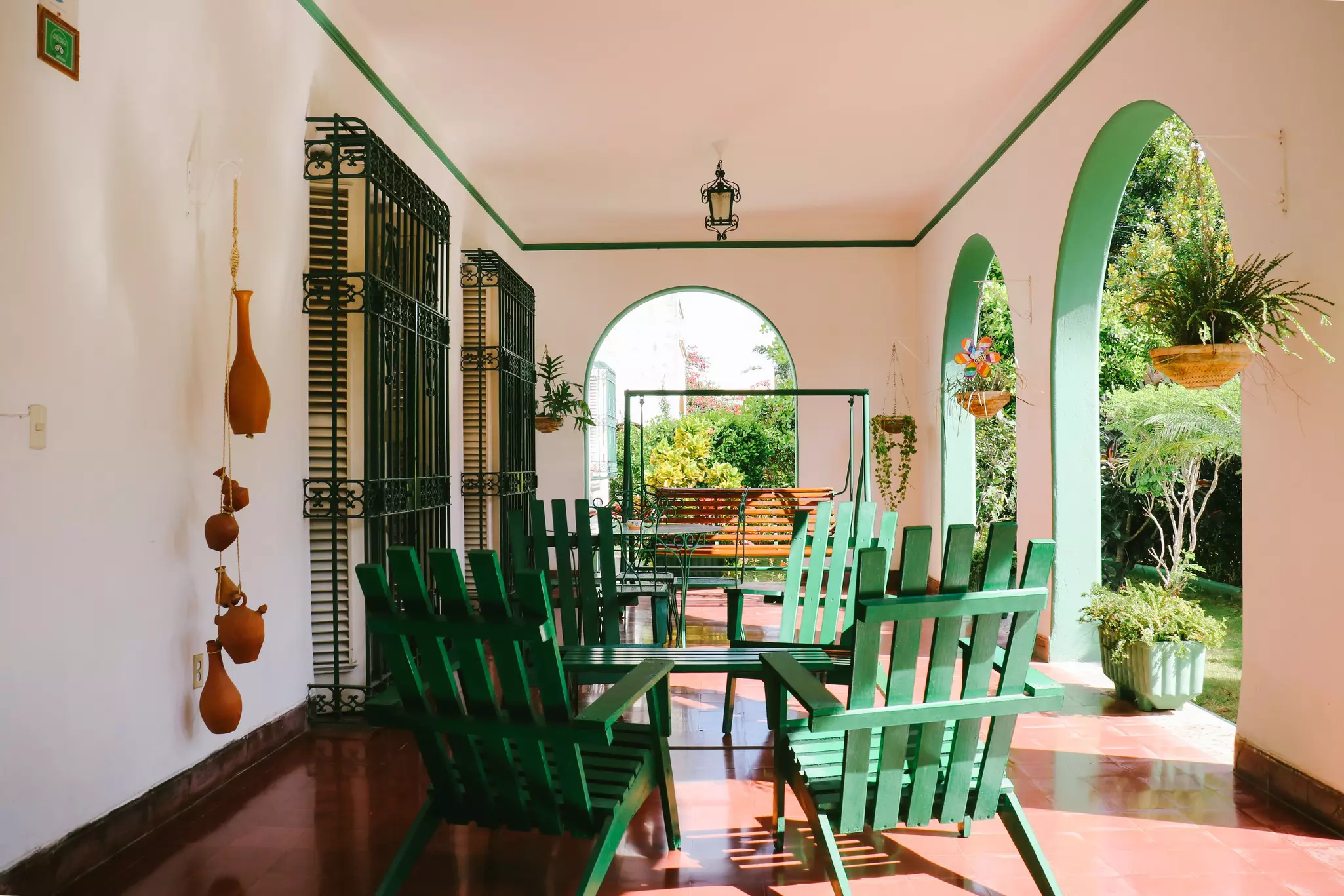 HAVANA, CUBA - CIRCA JANUARY 2017: Veranda of a colonial villa in the once-wealthy neighborhood of Vedado in Havana, Cuba, License Type: media, Download Time: 2025-11-27T19:40:03.000Z, User: bhealy950, Editorial: true, purchase_order: 65050 - Digital Destinations and Articles, job: Lonely Planet Online Editorial, client: Accommodations in Cuba, other: Brian Healy