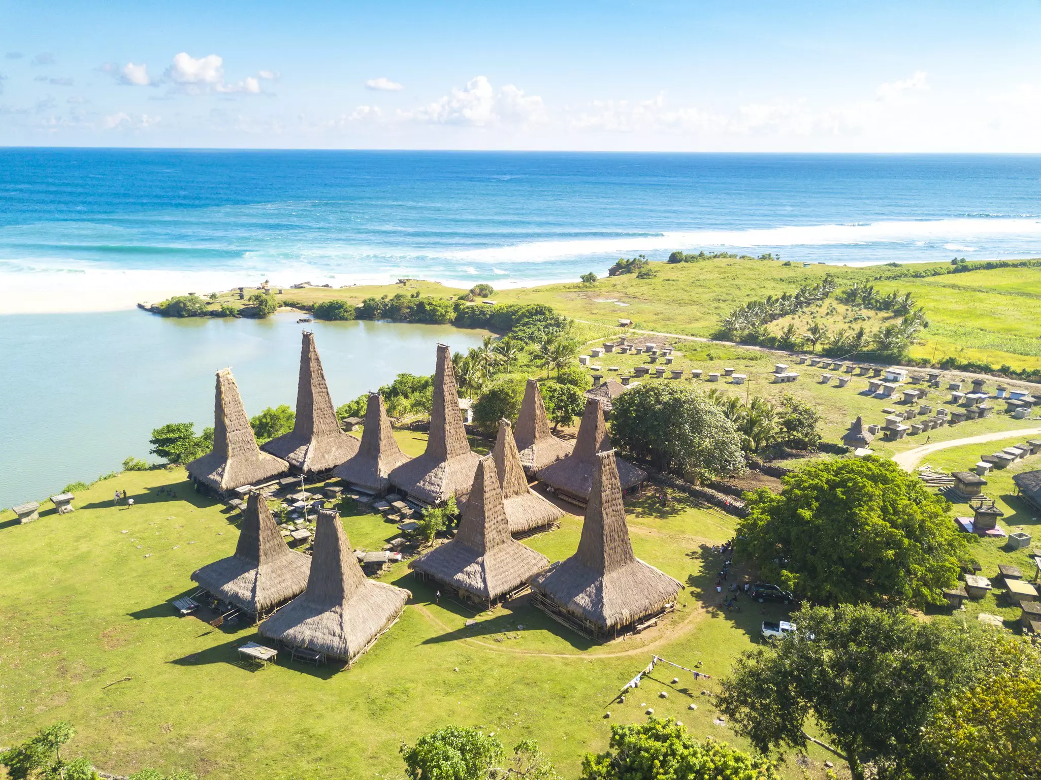 Aerial of the Kampung Adat Ratenggaro traditional village on the Western coast of Sumba.