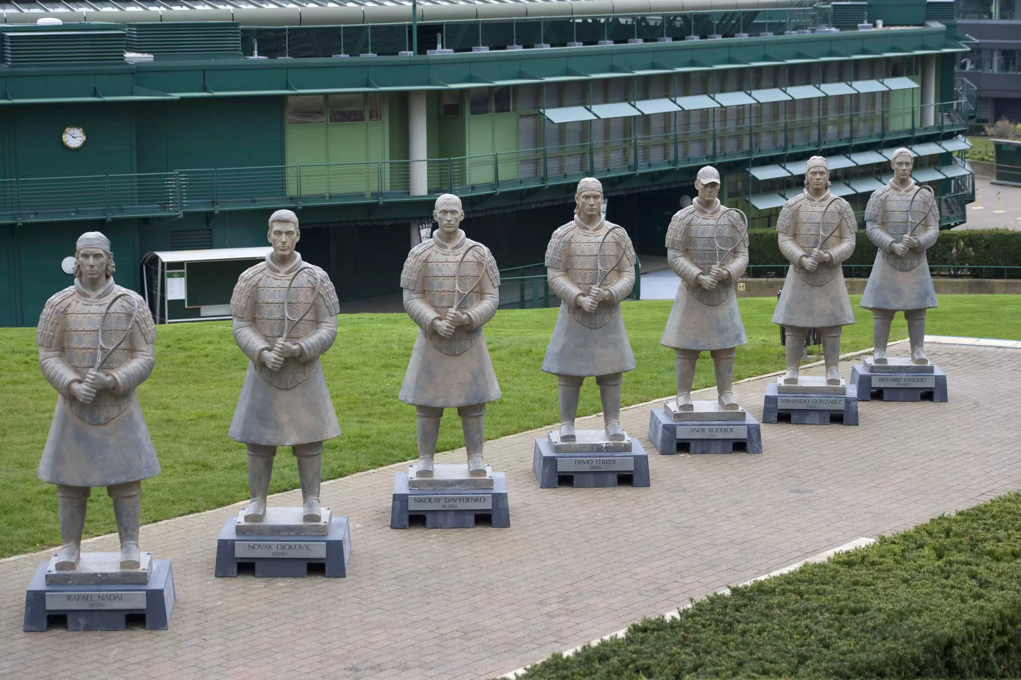 Player statues at Wimbledon Lawn Tennis Museum .