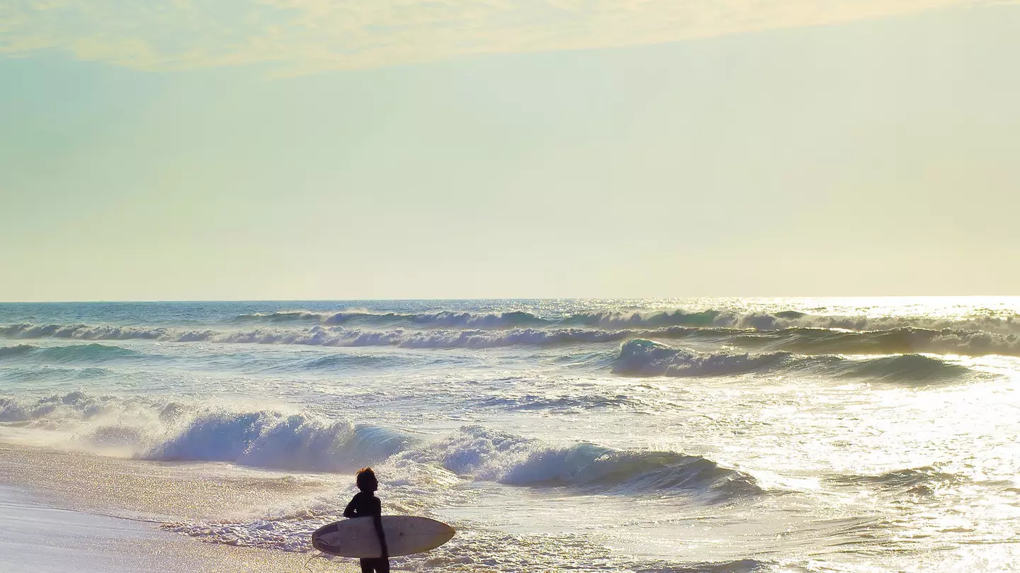Unidentified surfer on the Atlantic coast of Swakopmund.