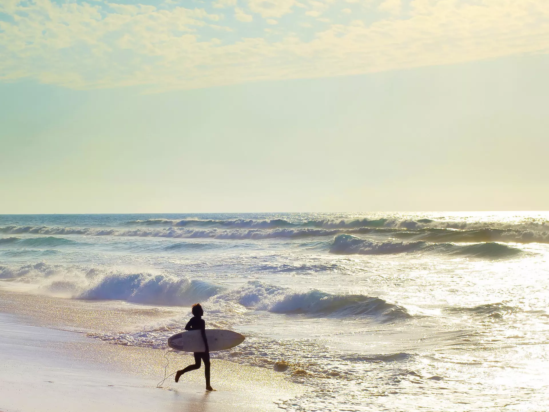 Unidentified surfer on the Atlantic coast of Swakopmund.