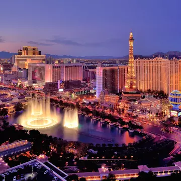 City skyline at night with Bellagio Hotel water fountains, Las Vegas, Nevada, America, USA