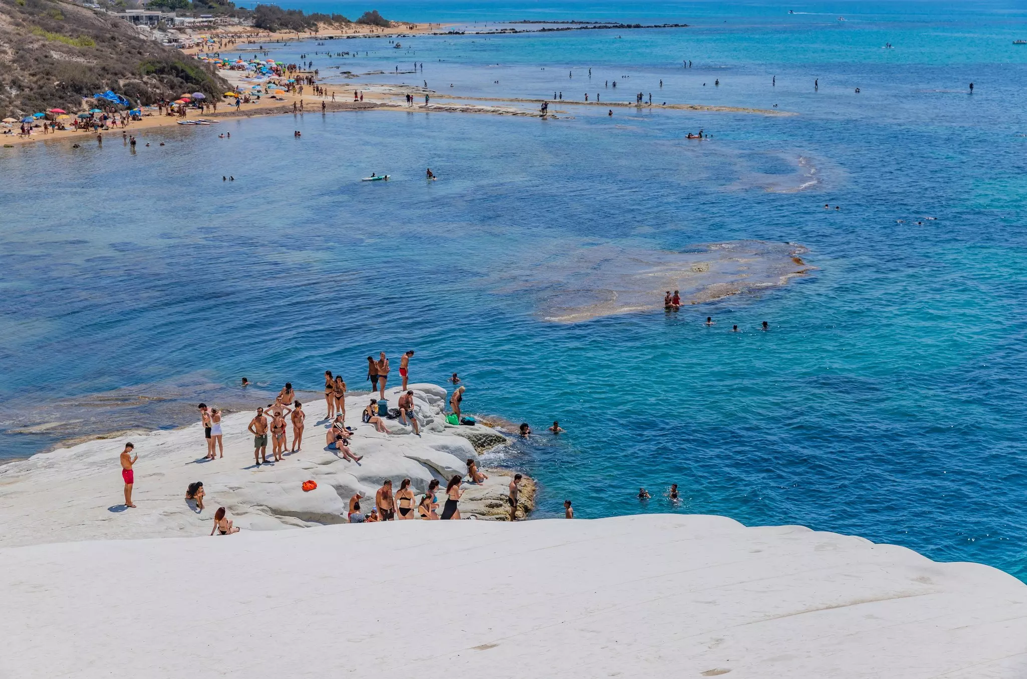 People enjoying the beach of Scala dei Turchi (Stair of the Turks)