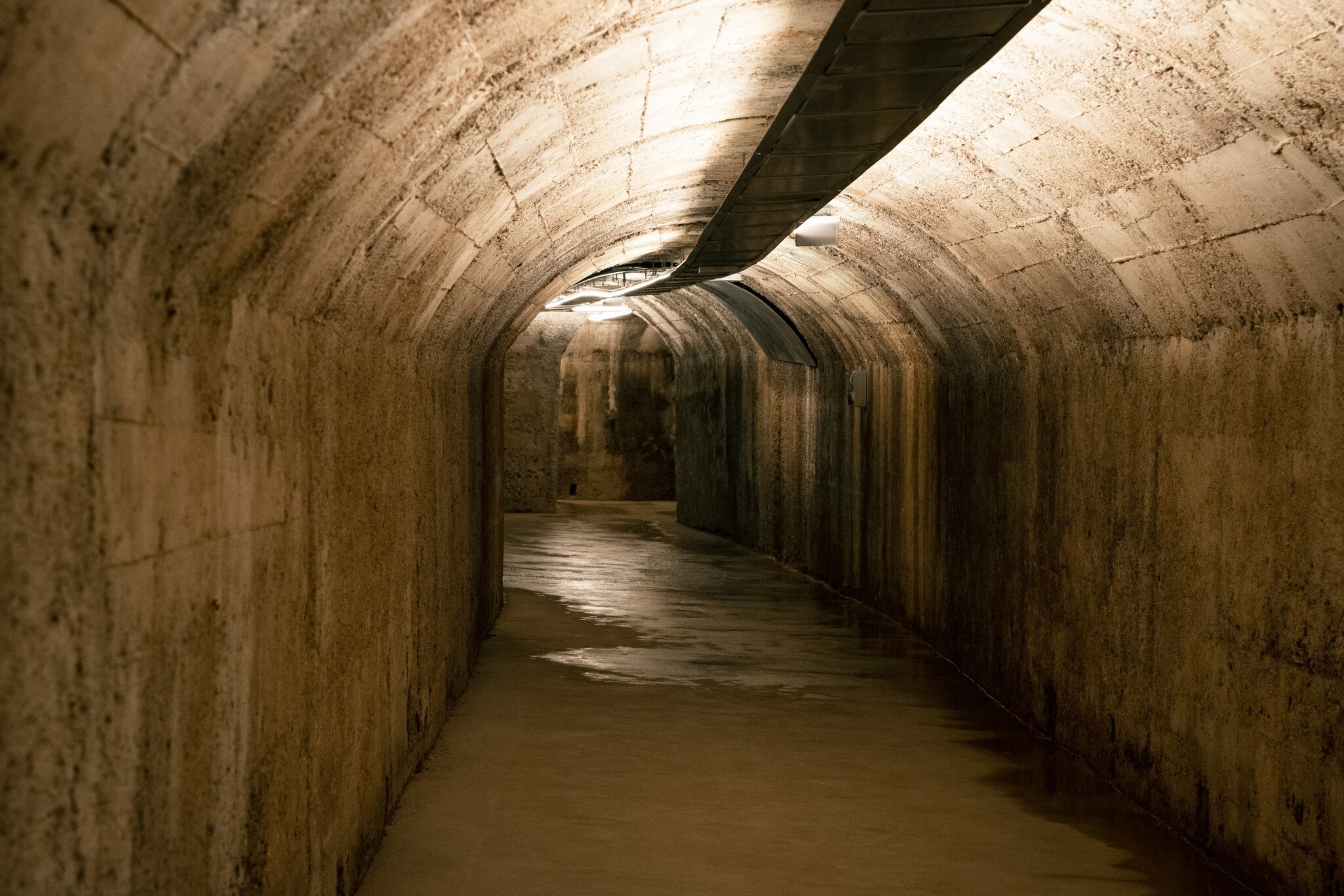 Dark tunnel of underground military shelter Zerostrasse in Pula Croatia   License Type: media  Download Time: 2023-11-04T00:47:53.000Z  User: claramonitto  Is Editorial: No  purchase_order: