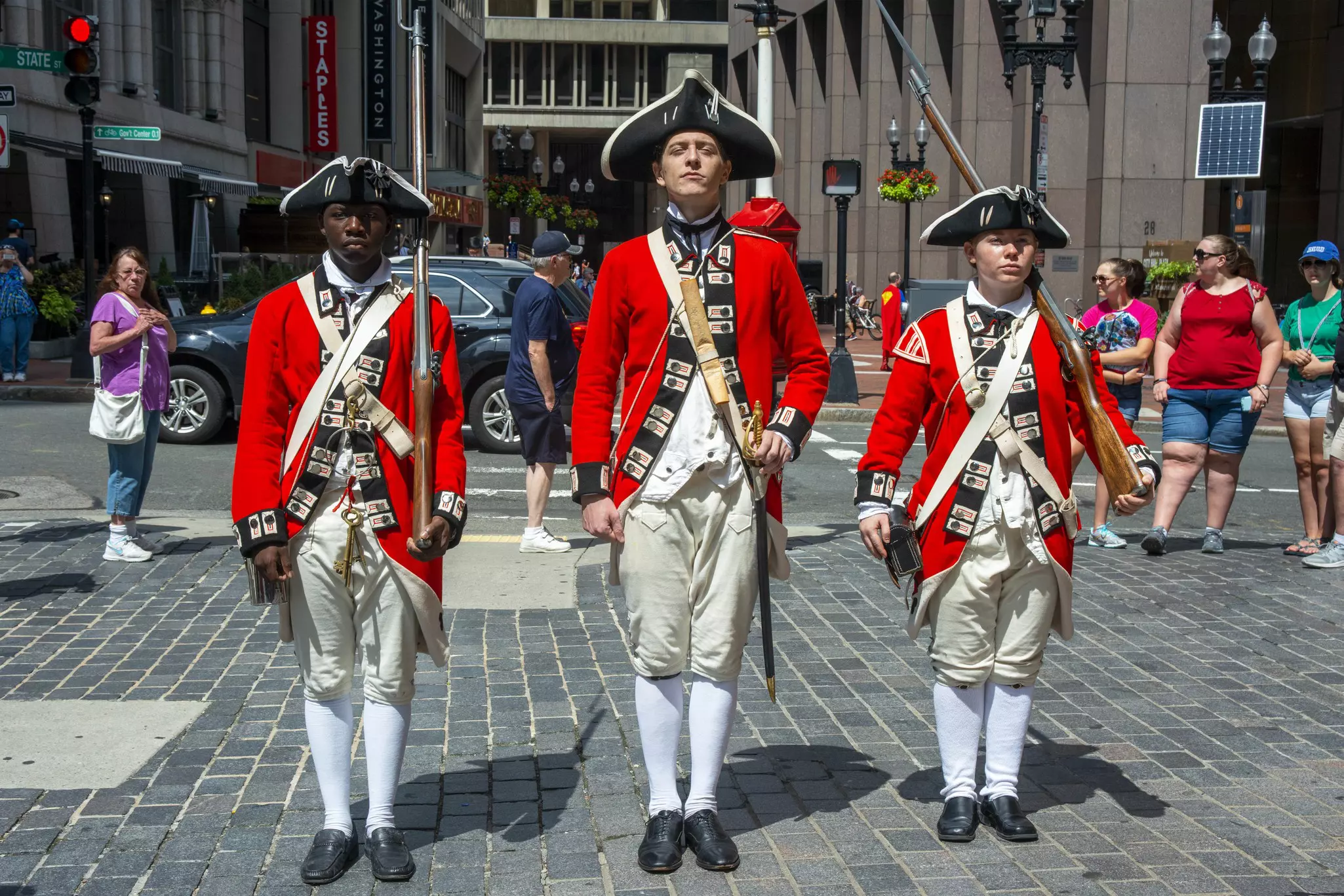 Re-enactors dressed as Redcoat soldiers by The Old State House, Boston