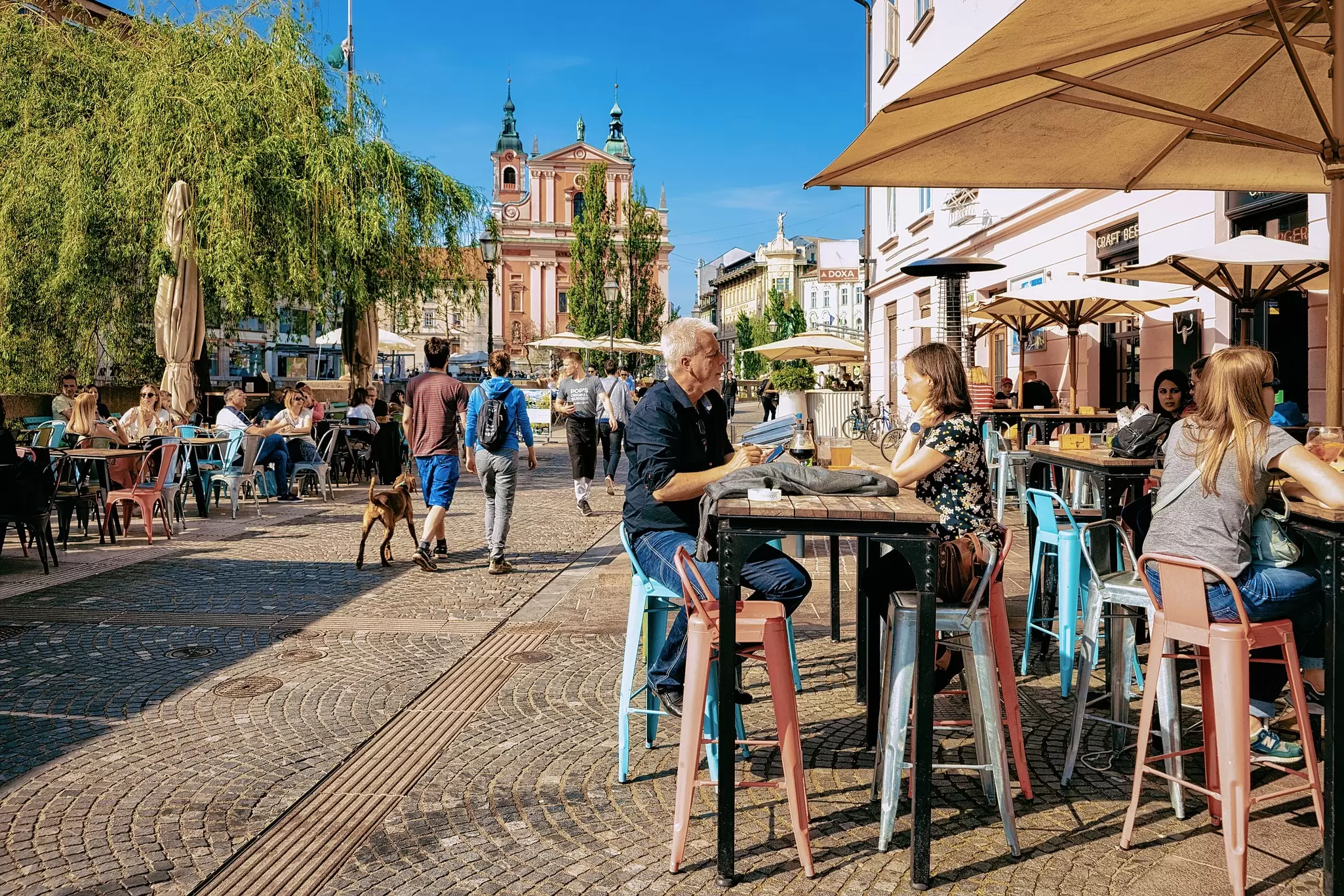 There's plenty to fill a weekend break in Ljubljana, from museum visits to riverside walks and breaks at pavement cafes and restaurants. Roman Babakin/Shutterstock 