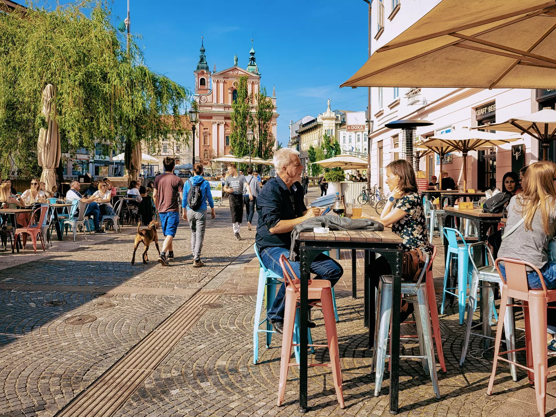 There's plenty to fill a weekend break in Ljubljana, from museum visits to riverside walks and breaks at pavement cafes and restaurants. Roman Babakin/Shutterstock 