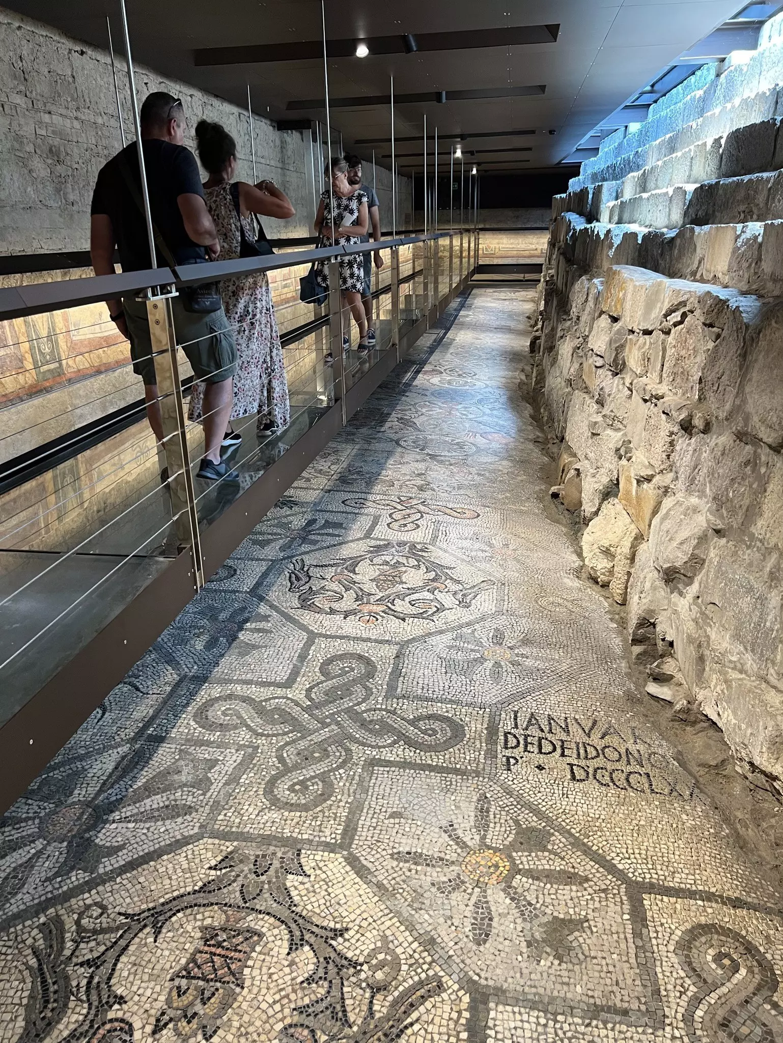 An elevated glass floor  goes over the original Roman mosaics at the Basilica di Santa Maria Assunta © Katryna Snow / Lonely Planet