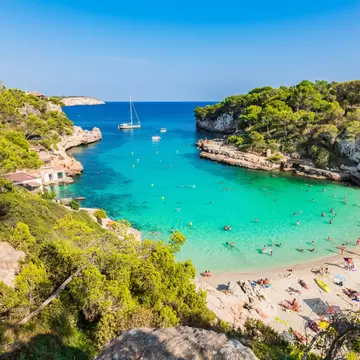 Aerial view of the bay beach of Cala Llombards on the island of Mallorca in Spain.