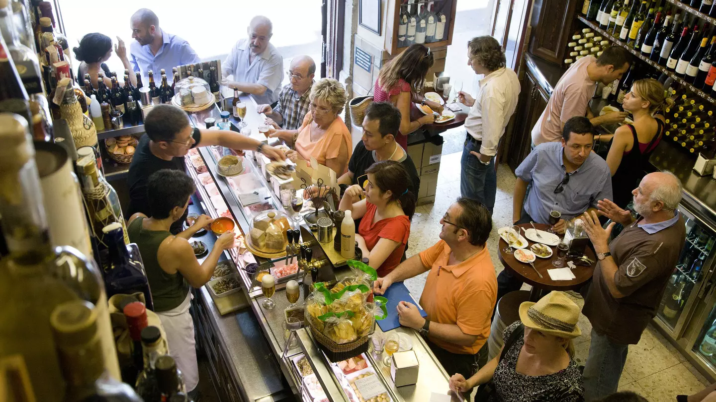 People at Quimet i Quimet tapas bar in Poble Sec ©Michael Heffernan/Lonely Planet