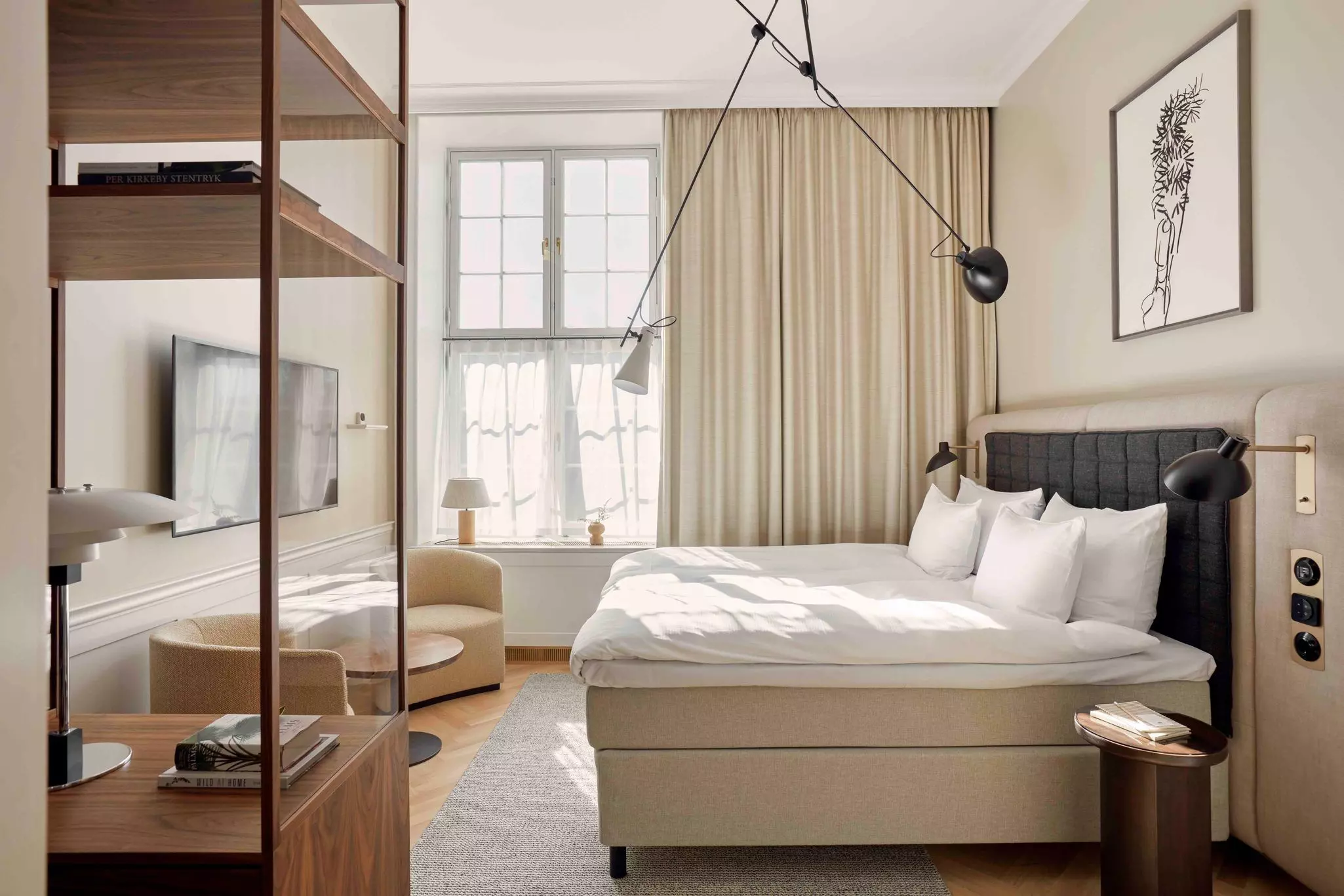 A crisp, white room with beige furniture