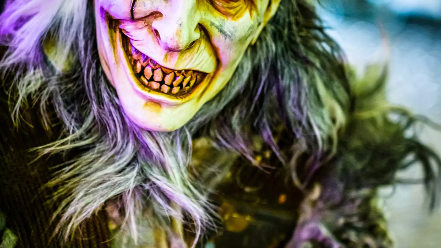 Closeup of a person dressed up in a ghoulish Krampus demon costume