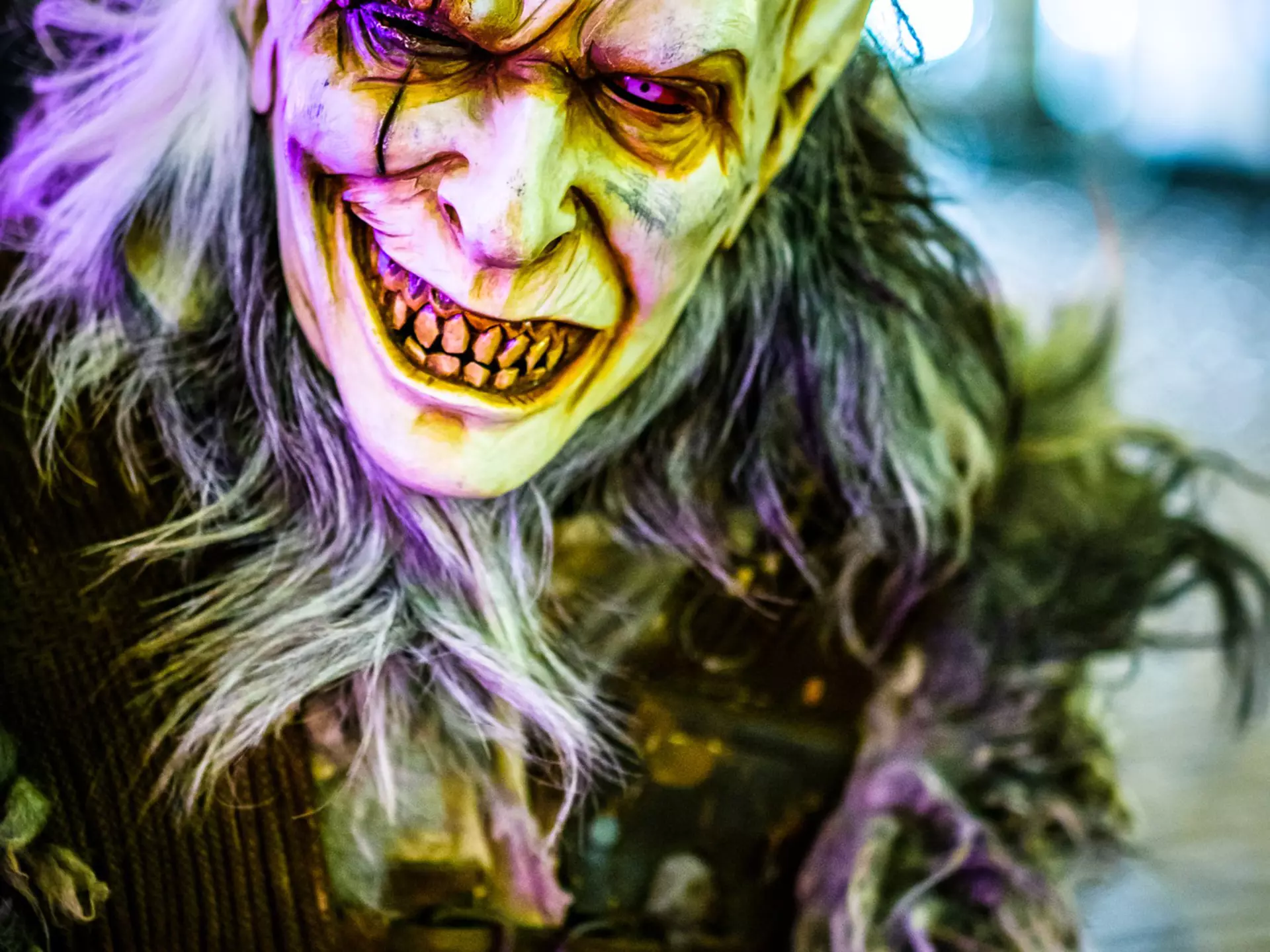 Closeup of a person dressed up in a ghoulish Krampus demon costume