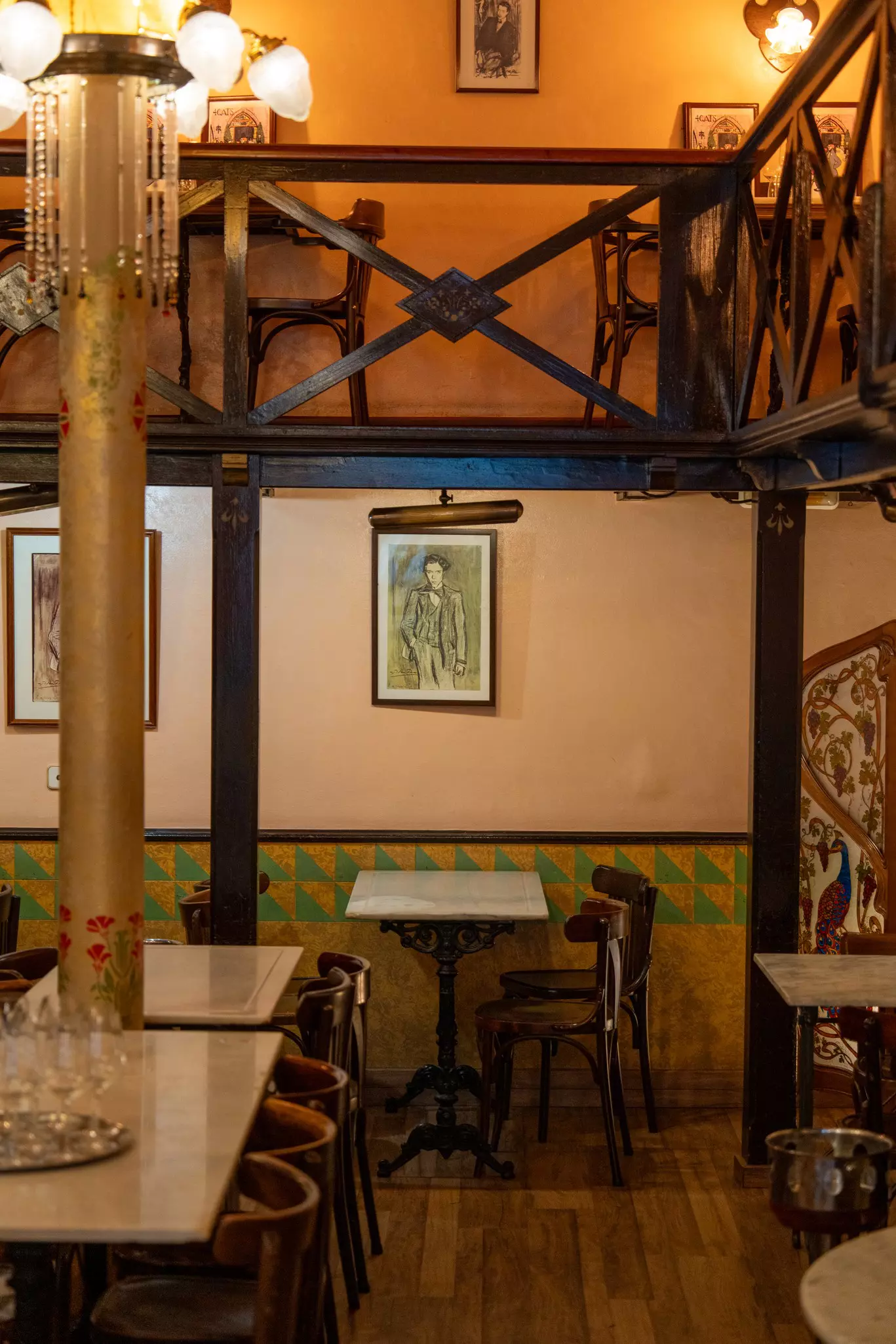 Empty table and chairs at Els 4Gats, an Art Deco restaurant once frequented by Gaudí and Picasso.